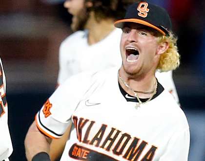 Oklahoma State's Roc Riggio celebrates following a 10-5 win in the NCAA Stillwater Regionals over the Missouri State Bears.